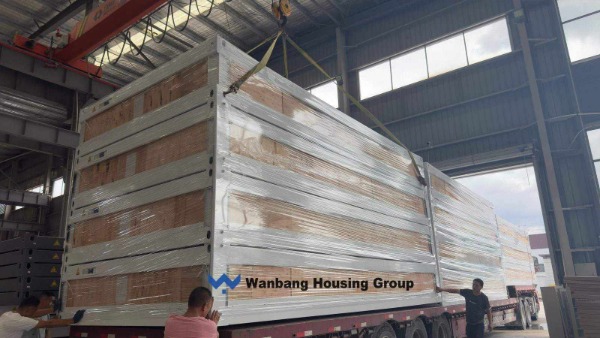 Flat-pack container houses loaded into a 40HQ container &mdash; Wanbang knock-down shipping